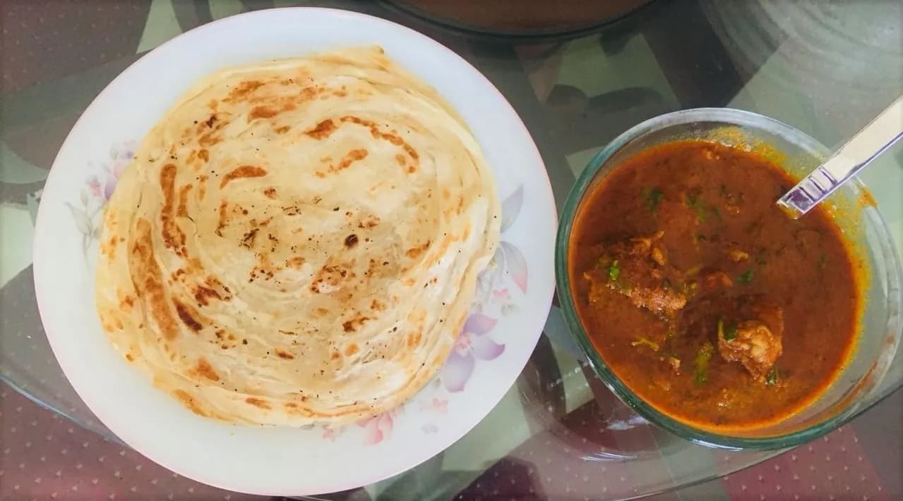 Parotta or Naan with Chicken Curry