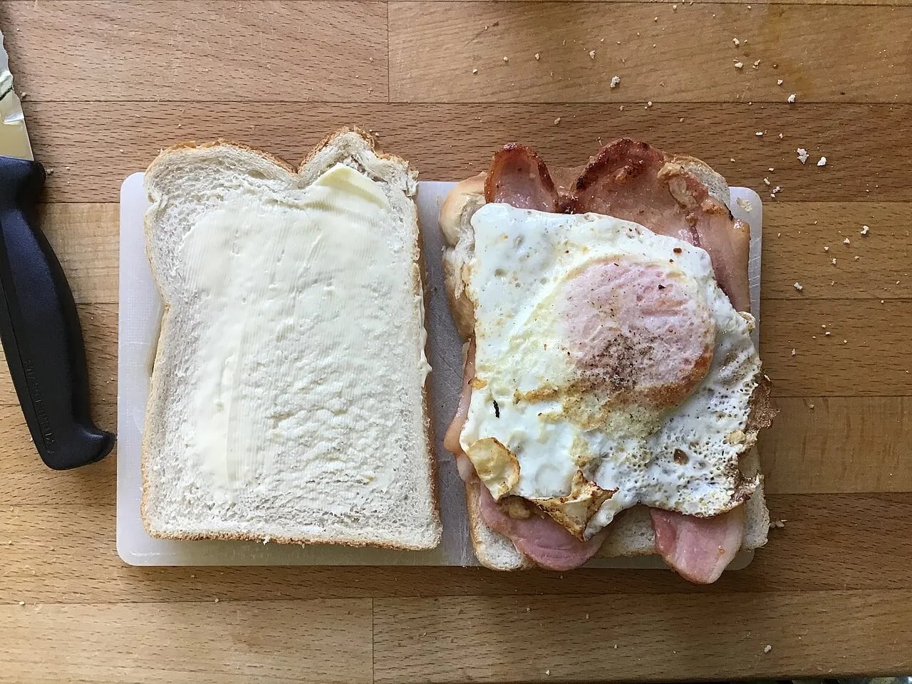 Sausage & Bacon Sandwich / Bap with a Fried Egg